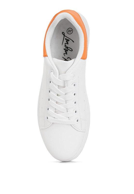 Women's white sneakers with orange accents for casual wear