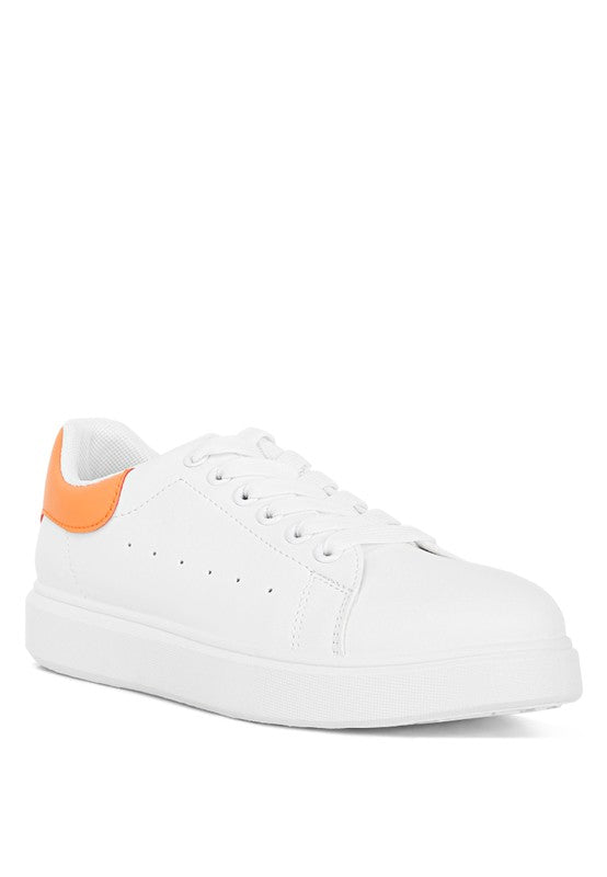 Women's white sneakers with orange accents, stylish and comfortable for everyday wear