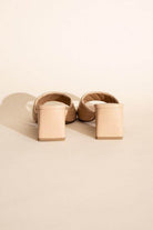 Fortune Dynamic Nina block heel mules in nude with a stylish open back and padded straps