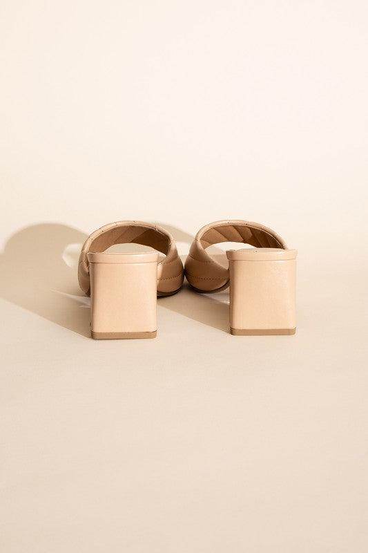 Fortune Dynamic Nina block heel mules in nude with a stylish open back and padded straps