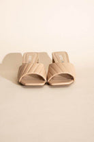 Fortune Dynamic Nina block heel mules in beige with a stylish quilted design for optimal comfort