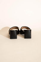 Fortune Dynamic Nina block heel mules in black with a stylish open-back design