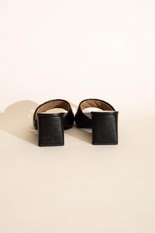 Fortune Dynamic Nina block heel mules in black with a stylish open-back design