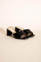 Fortune Dynamic Nina block heel mules in black with a stylish quilted design for women's fashion