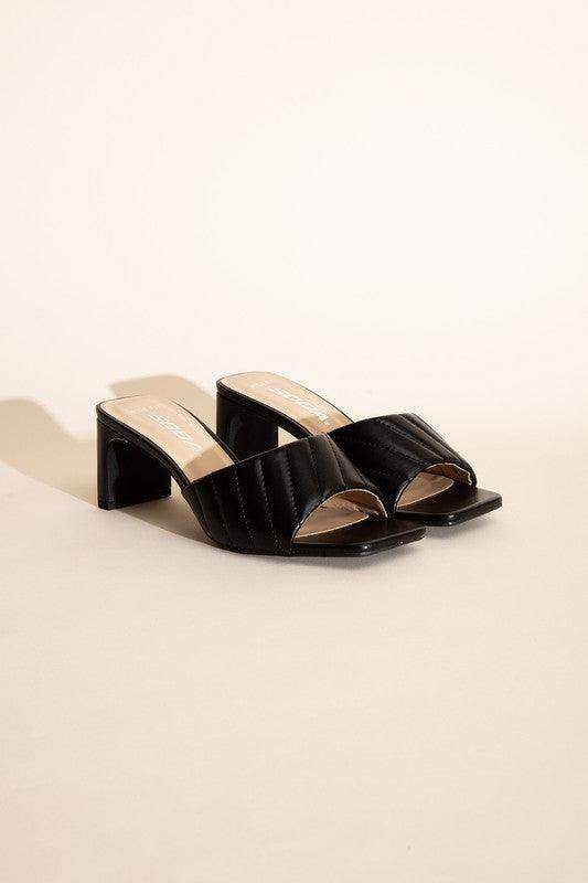 Fortune Dynamic Nina block heel mules in black with a stylish quilted design for women's fashion