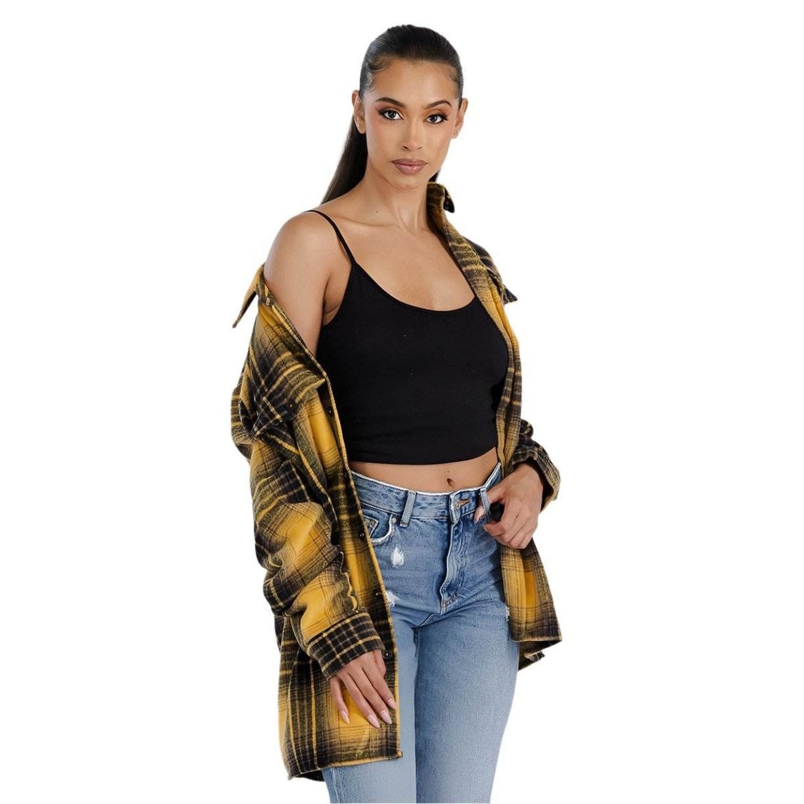 Stylish model wearing a soft flannel boyfriend jacket paired with a black top and blue jeans
