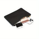 Black zippered pouch showing contents including a phone and wallet, ideal for a soft hobo bag with drawstring handle