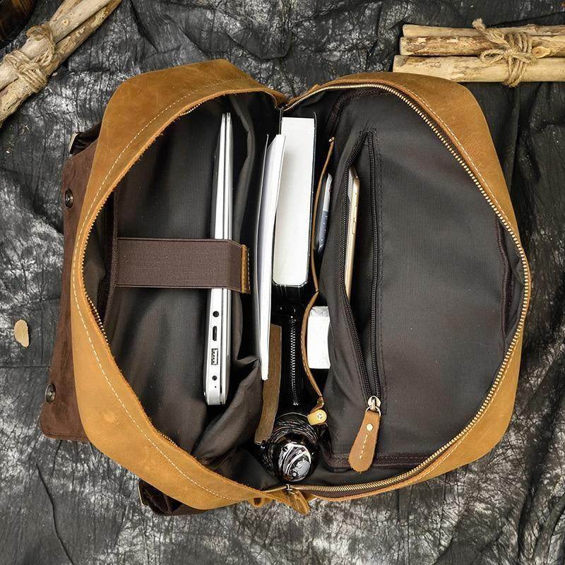Interior view of soft leather backpacks for travel showcasing spacious compartments and organizational pockets