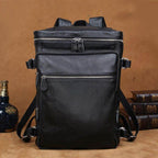 Soft leather travel backpack in black featuring multiple zippered compartments and durable straps