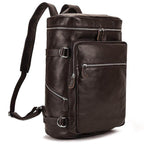 Stylish soft leather travel backpack in dark brown with multiple zippers and spacious compartments