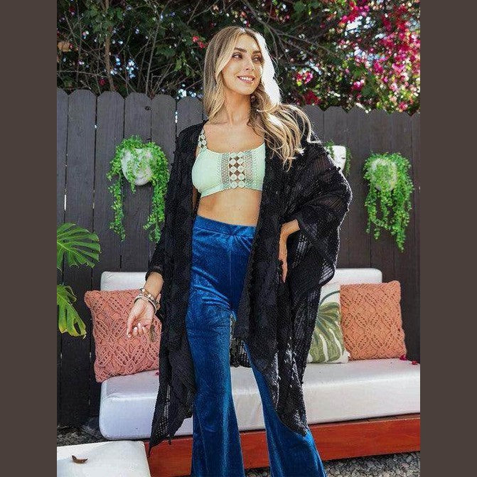 Leto Accessories soft open front kimono in black worn over a crop top and blue pants for a stylish look