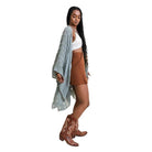 Leto Accessories soft open front kimono in light blue paired with a brown skirt and cowboy boots