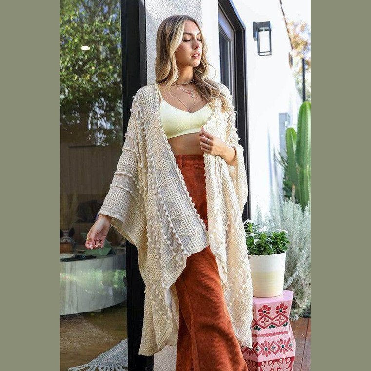 Leto Accessories soft open front kimono in cream with fringe detail, perfect for layering over outfits