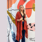 Leto Accessories soft open front kimono in rust color effortlessly layered over a stylish outfit