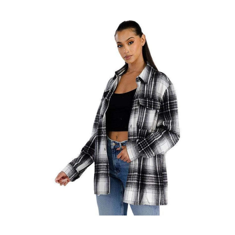 Soft plaid womens shacket in black and white with a relaxed fit and front pockets