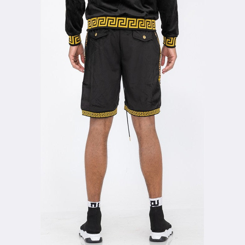 Back view of black soft velour athletic shorts with yellow Greek key pattern trim by WEIV