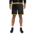 WEIV black soft velour athletic shorts with gold patterned trim worn by male model