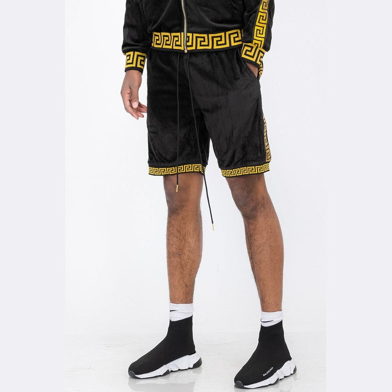 WEIV black soft velour athletic shorts with gold geometric trim worn by male model