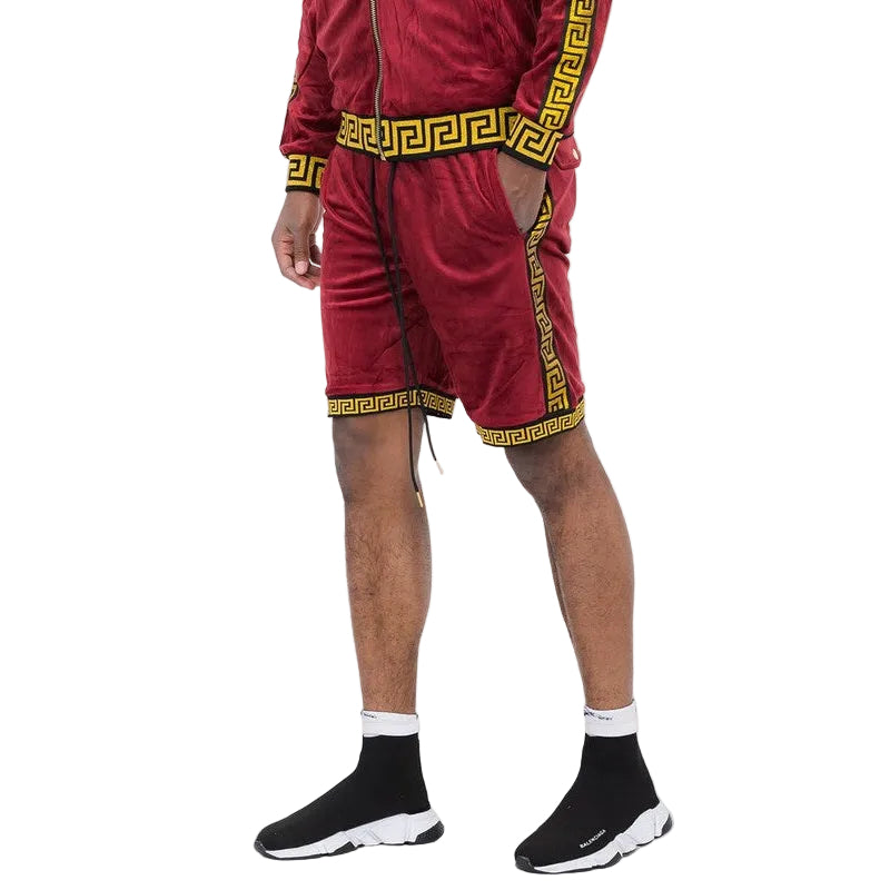 WEIV soft velour athletic shorts in burgundy with yellow Greek key trim worn with matching top