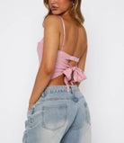 Women's solid back knot tank top in pink with stylish bow detail and adjustable straps