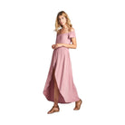 Solid color off shoulder dress in light pink with a flowy design and side slit for a stylish summer look