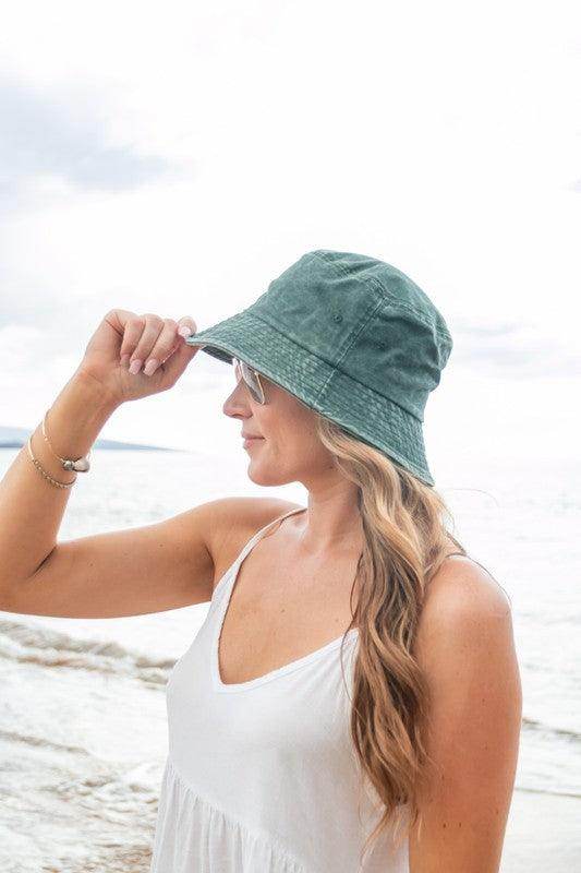 Aili's Corner solid color vacation hat in green, perfect for beach outings and sunny days