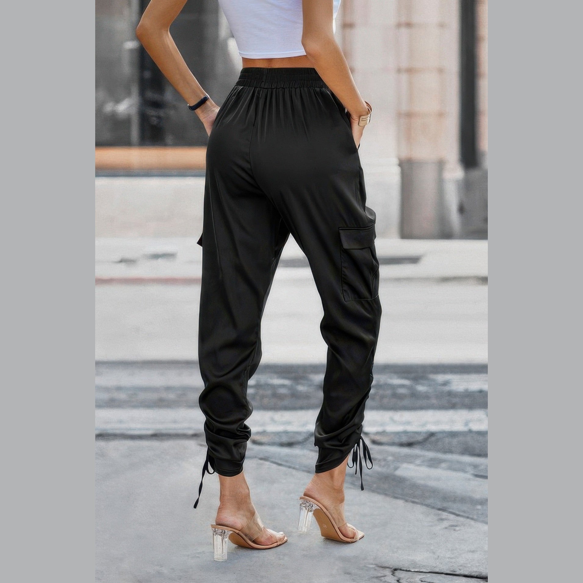 VacationGrabs women's solid drawstring hem streetwear pants in black with cargo pockets and elastic waistband