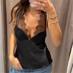 Women's black spaghetti strap tank top for stylish layering