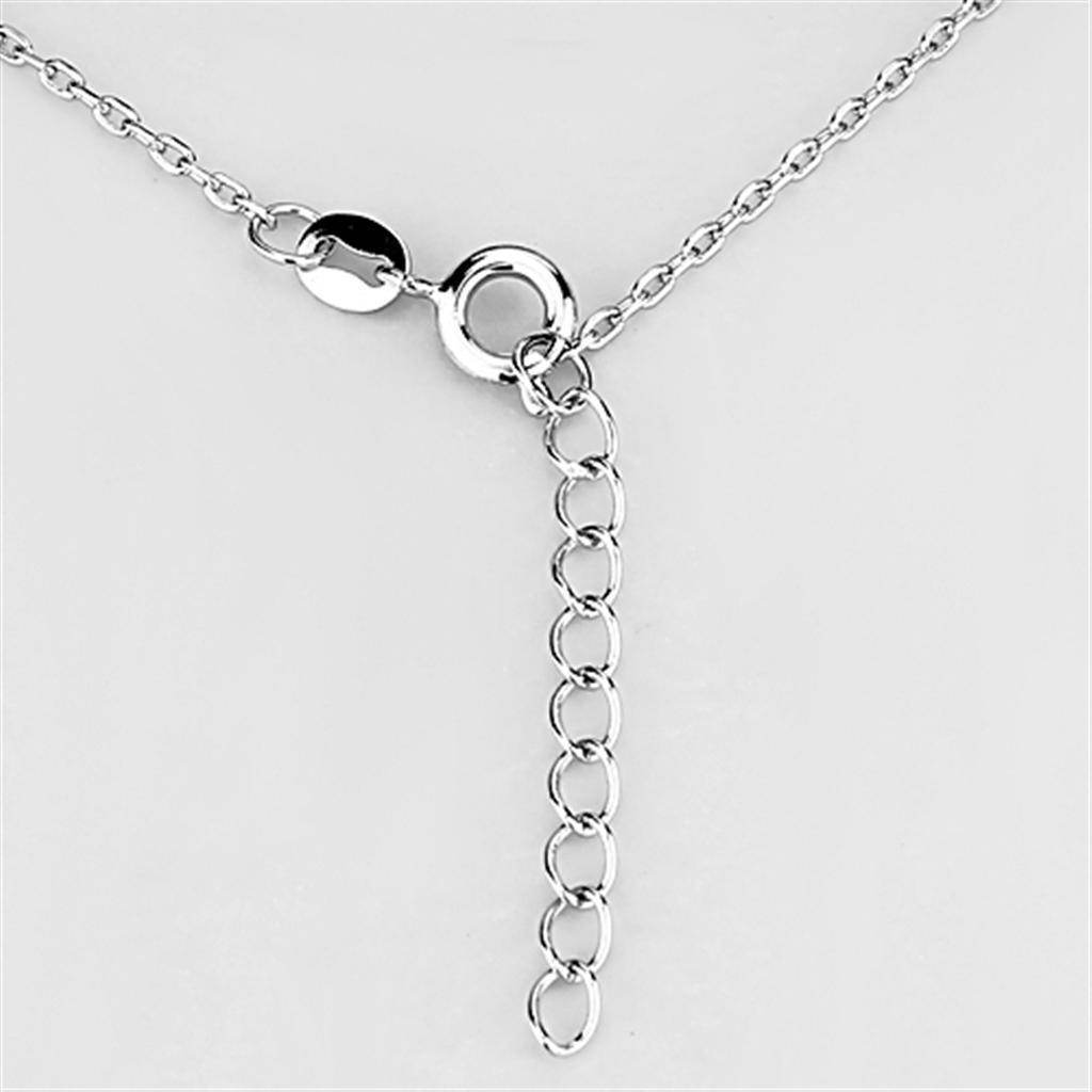 Close-up of a sparkling rhodium plated necklace with a delicate chain and adjustable clasp