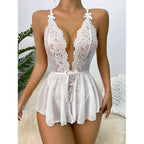 White lace special occasion lingerie with adjustable straps and ruffled hem