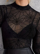 Trendsi spider web print blouse featuring a sheer design and long sleeves for a stylish look