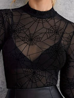 Trendsi spider web print blouse featuring a sheer design and long sleeves for a stylish look