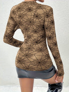 Trendsi women's spider web print blouse in brown with long sleeves and fitted design