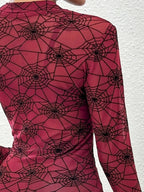 Trendsi women's spider web print blouse in red featuring long sleeves and a stylish design
