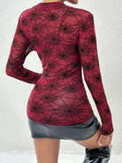 Trendsi women's spider web print blouse in burgundy with long sleeves and form-fitting design