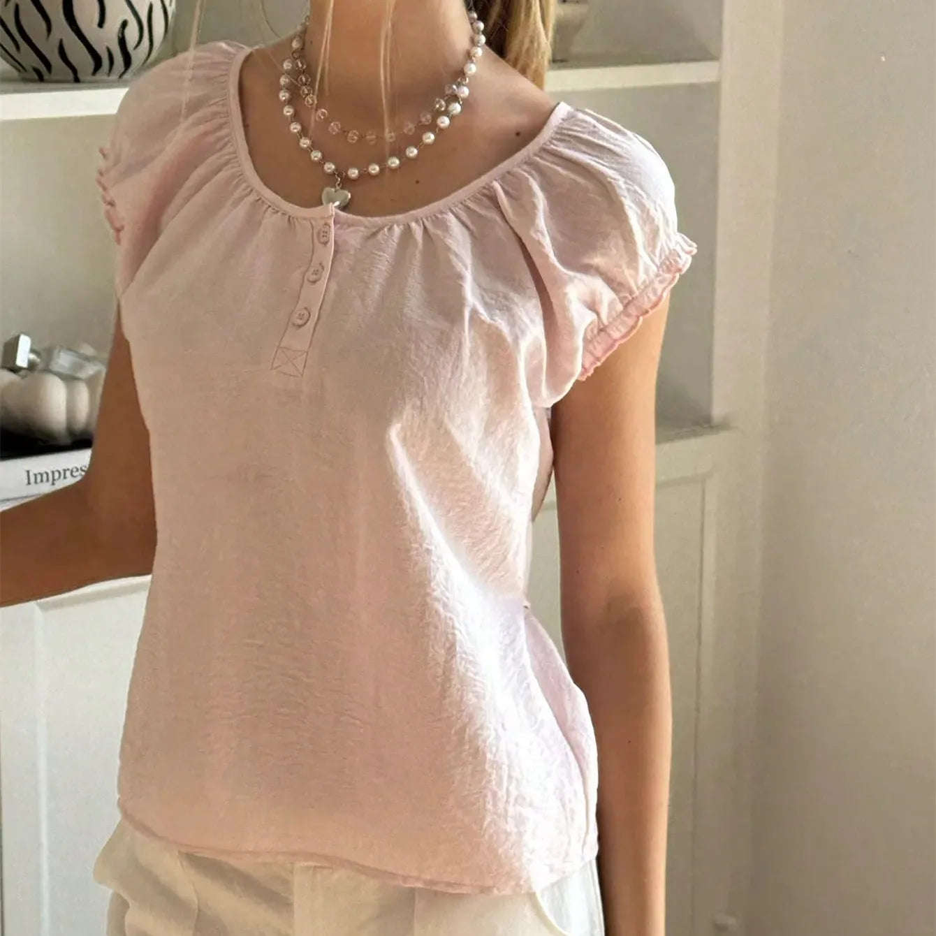 Women's pink square neck top made from lightweight cotton for casual wear