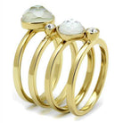 Set of stackable gold rings for women featuring two faceted stones and a clear gem for elegant layering