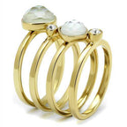Set of stackable gold rings for women featuring two faceted stones and a clear gem for elegant layering