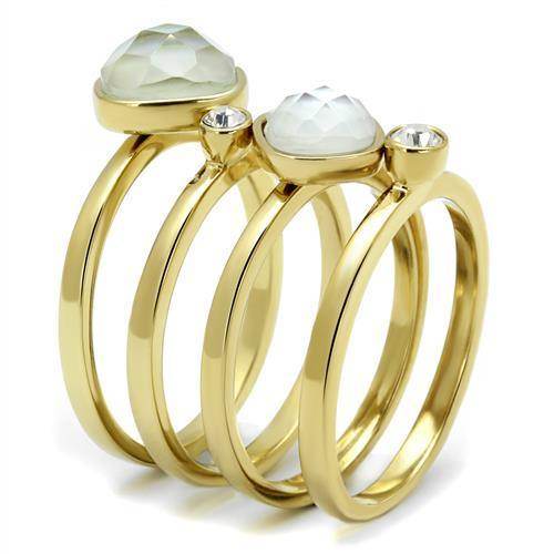 Set of stackable gold rings for women featuring two faceted stones and a clear gem for elegant layering
