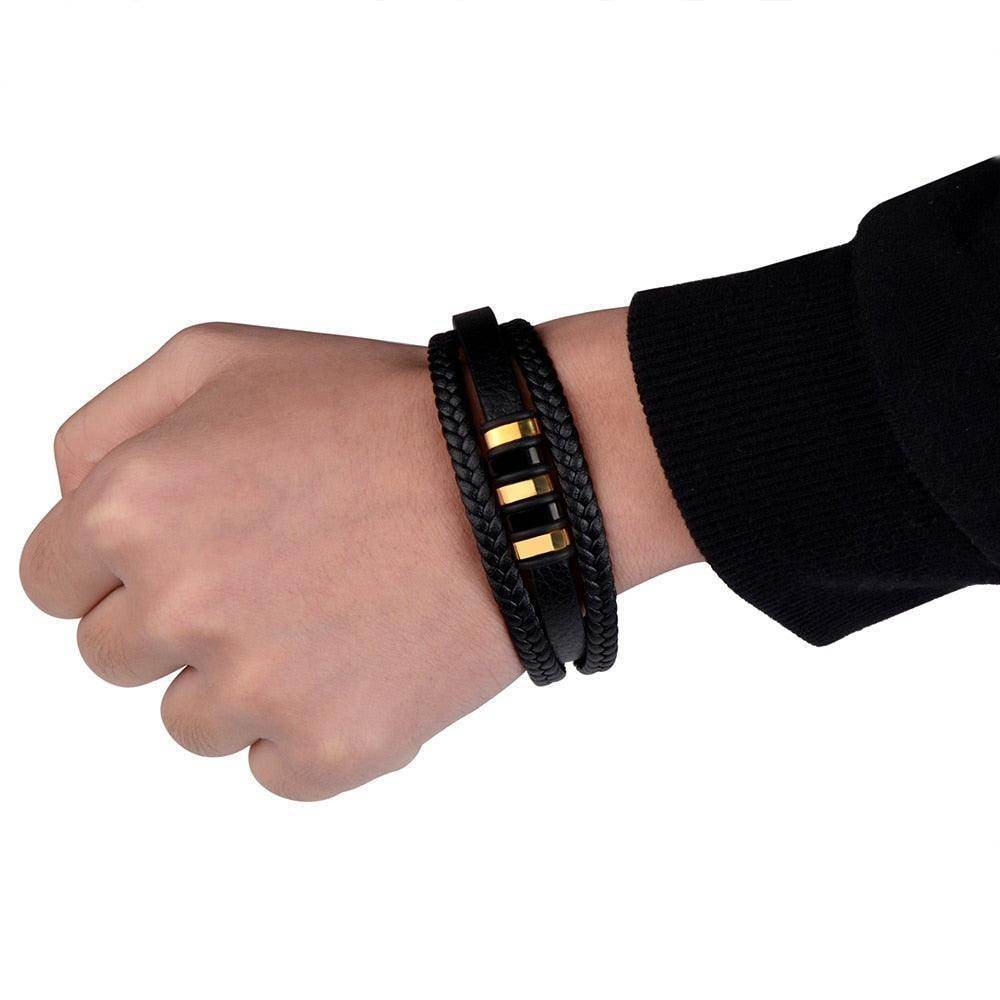 Men's black wristbands featuring a stainless steel clasp bracelet for stylish accessory options