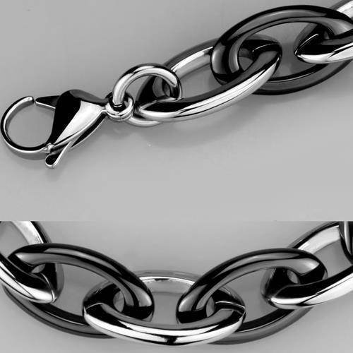 Bold black and silver statement bracelets for vacation outfits with a chunky link design
