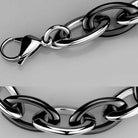 Bold black and silver statement bracelets for vacation outfits with a chunky link design
