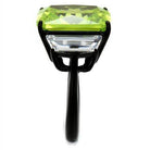 Stunning black metal statement cocktail ring for women featuring a large green gemstone and clear accents