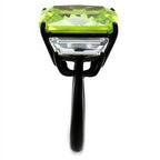 Stunning black metal statement cocktail ring for women featuring a large green gemstone and clear accents