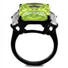Bold statement cocktail ring for women featuring a large green center stone and two clear accent stones