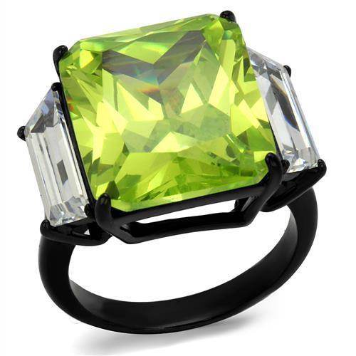 Statement cocktail ring for women featuring a large green gemstone and clear accents in a black setting
