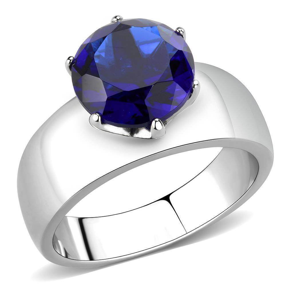 Elegant statement cocktail ring for women featuring a large blue gemstone on a polished silver band