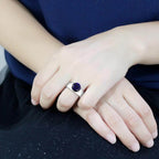 Stunning statement cocktail ring for women featuring a large gemstone on a sleek band