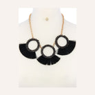 Stylish statement necklace and earring set for women featuring black tassels and beaded accents