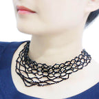 Stylish statement necklace rhodium brass with intricate layered design for a bold fashion statement